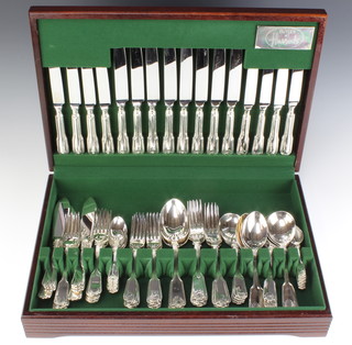 A mahogany canteen containing a set of plated cutlery for 8 