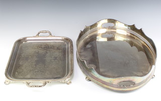 A silver plated galleried 2 handle tray 61cm, a rounded rectangular ditto 