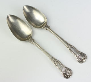 A George III silver kings pattern table spoon, London 1812 and 1 other, 188 grams 