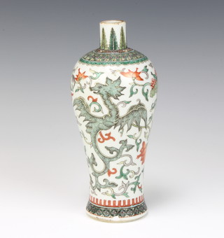 An early 20th Century Chinese famille verte oviform vase decorated with dragons amongst scrolling foliage with double ring mark to the base 23cm 