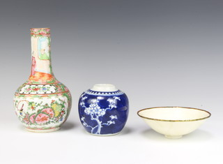 A late 19th Century Cantonese bottle vase decorated with panels of figures 20cm, a modern prunus ginger jar and an enamelled bowl decorated with fish and flowers 14cm 