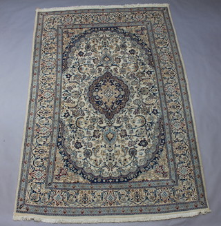 A blue and white ground Nain carpet with central medallion 296cm x 199cm 