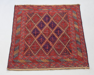 A red and blue ground Afghan rug, the centre formed of numerous diamonds within a multi row border 132cm x 121cm  
