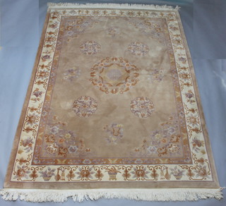 A camel coloured floral patterned Chinese rug 340cm x 249cm 