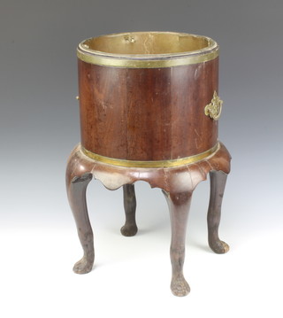 A Georgian style coopered mahogany jardiniere, raised on panel supports 47cm h x 27cm diam. complete with metal liner 