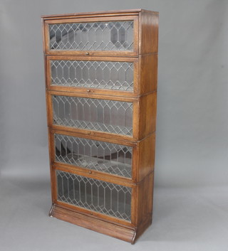 An oak 5 tier Globe Wernicke style bookcase enclosed by lead glazed doors 178cm h x 88cm w x 32cm d 