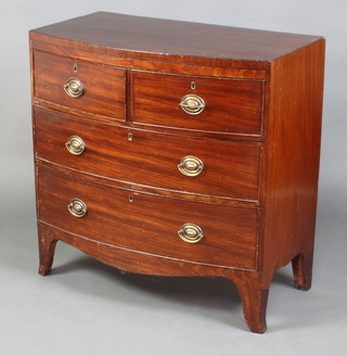 A 19th Century mahogany bow front chest of 2 short and 2 long drawers with replacement handles, raised on splayed bracket feet 88cm h x 89cm w x 49cm d 