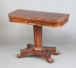 A Victorian rosewood D shaped card table, raised on a chamfered column and triform base with scrolled feet 73cm h x 92cm w x 45cm d 