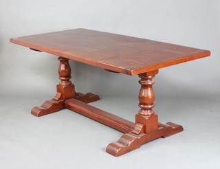 An 18th Century style cherry refectory dining table the top formed of 4 planks, raised on turned supports with H framed stretcher together with an extension 77cm h x 91cm w x 183cm l x 236cm when extended 