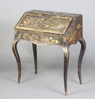 A 19th/20th Century black lacquered chinoiserie style bonheur du jour, the fall front revealing a well fitted interior with drawer and pigeon hole above 1 long drawer, raised on cabriole supports 86cm h x 66cm w x 45cm d 