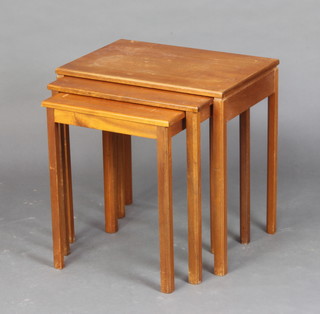 A H McIntosh and Company, a mid 20th Century nest of 3 teak interfitting coffee tables on square supports 54cm h x 53cm w x 36cm d (some water damage to the top) 