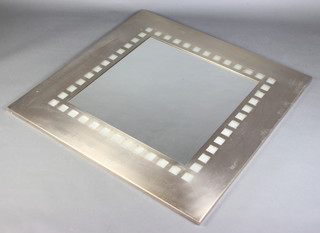 A designer plate wall mirror contained in a decorative polished steel frame 107cm x 110cm 