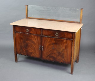 A 1930's mahogany wash stand with raised splash back and pink veined marble top, the base fitted 2 drawers above a double cupboard 104cm h x 122cm w x 55cm d 