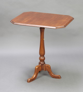 A 19th Century octagonal mahogany snap top wine table raised on turned column and tripod base 70cm h x 62cm w x 51cm d (slight scratches to the top and old repair to the leg) 