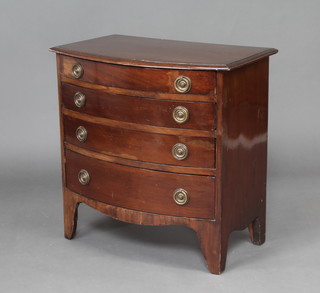 A Georgian style mahogany bow front chest of 4 long drawers with replacement brass ring drop handles, raised on bracket feet 66cm h x 66cm w x 40cm d 
