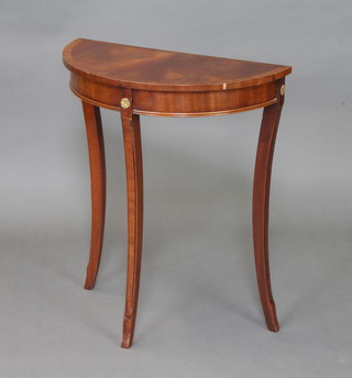 A Georgian style mahogany demi-lune hall table raised on outswept supports 70cm h x 60cm w x 30cm d 