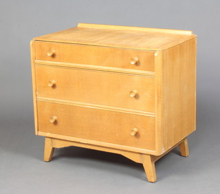 A 1960's light oak chest of 3 drawers with tore handles 70cm h x 76cm w x 44cm d 