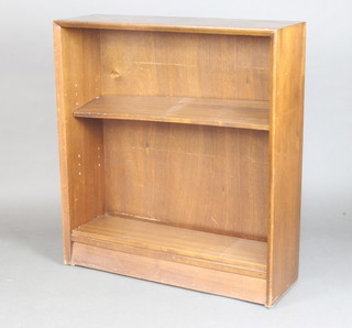 A glass fronted oak bookcase fitted adjustable shelves 85cm h x 76cm w x 24cm d