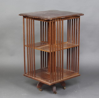 An Edwardian square 2 tier revolving bookcase 78cm h x  49cm w x 49cm d