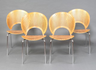 Nanna Ditzel, a set of 4 plywood and tubular metal Trinidad stacking chairs with pierced fan shaped backs  (some chips to the plywood) 