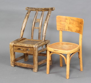 A child's 1960's plywood chair, the back decorated a scene with Dutch boy and girl and a child's rustic hardwood chair 

