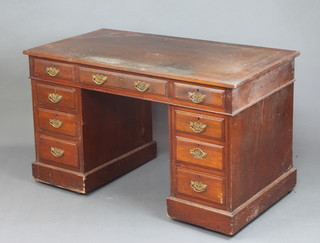 A Victorian mahogany desk with inset writing surface, fitted 1 long and 8 short drawers 71cm h x 123cm w x 66cm d 