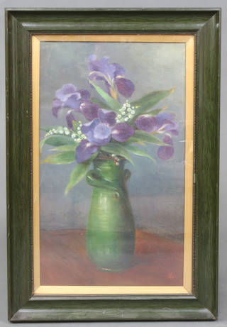 A 1920's oil painting on canvas, study of a green glazed vase with flowers 48cm x 28cm, monogrammed SH? 