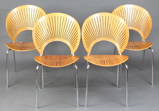 Nanna Ditzel, a set of 4 plywood and tubular metal Trinidad stacking chairs with pierced fan shaped backs (some chips to the plywood)