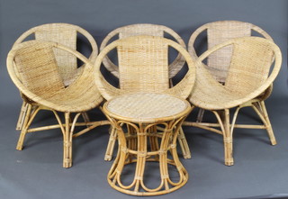 A circular bamboo and rattan occasional table 62cm h x 54cm diam. together with 4 ditto stacking chairs and 2 rattan effect stacking chairs 