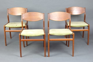 A set of 4 mid Century teak bar back dining chairs with upholstered seats 