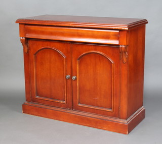 A Victorian style mahogany chiffonier by Waring & Gillow with secret drawer above a pair of double cupboards enclosed by panelled doors 90cm h x 108 cm w x 48cm d