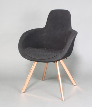 Tom Dixon, a Class 09 Scoop Chair,  upholstered in black felt material, raised on coppered supports 
