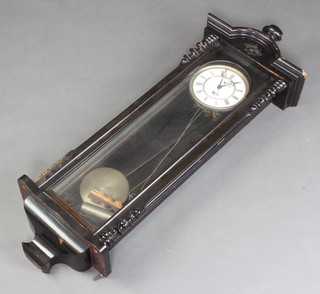 A "regulator" with enamelled dial and Roman numerals contained in an ebonised case 