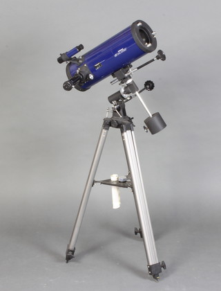 A Tasco Galaxsee telescope on stand