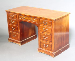 A Victorian walnut desk/dressing table with inset brown leather writing surface, fitted 9 drawers with brass swan neck drop handles 79cm h x 137cm w x 58cm d (filled holes to the top)