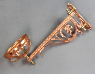 A reproduction Victorian pierced copper wall light bracket 16cm x 32cm  