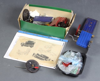 A red and blue Meccano model car 