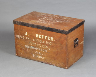 A teak and iron bound trunk with hinged lid 49cm h x 75cm w x 44cm d 