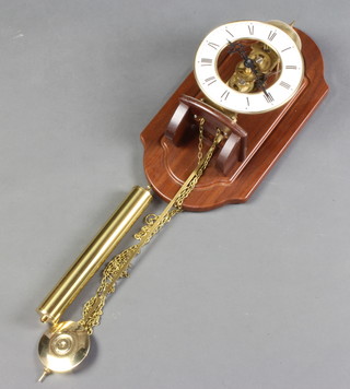 A German reproduction striking skeleton wall clock 