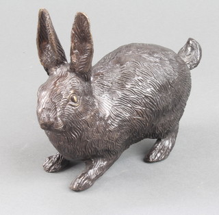 A contemporary bronze figure of a standing rabbit 