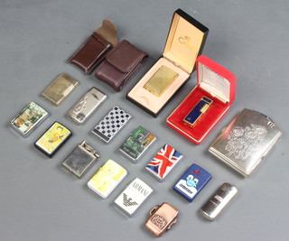 3 Colibri lighters together with a collection of other lighters