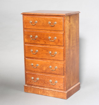 An oak chest of drawers with brass swan neck drop handles, raised on a platform base 103cm h x 61cm w x 41cm d 