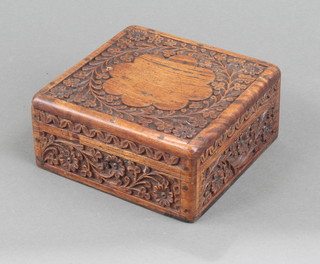 An Eastern carved hardwood trinket box with hinged lid 7cm x 15cm x 15cm 