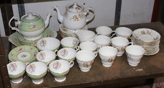 A Queen Anne Gainsborough pattern tea service together with a Colclough white and floral patterned tea service