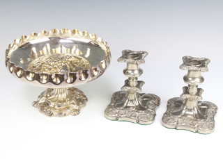 A silver plated repousse fruit bowl by Walker and Hall 14cm and a pair of ditto dwarf candlesticks 14cm 