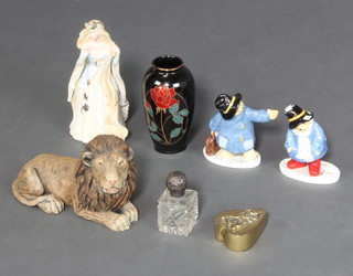 Two Coalport figures of Paddington, a resin figure of a lion, a Wedgwood figure of Rapunzel, a Japanese vase, a brass heart shaped trinket box and a circular cut glass jar with silver lid 
