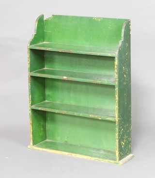 A green painted 4 tier wall shelf (slight damage to the top) 79cm h x 59cm w x 16cm d 