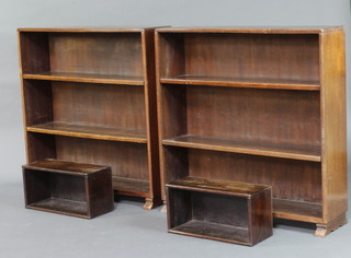 A pair of Art Deco mahogany bookcases fitted adjustable shelves 91cm h x 91cm w x 22cm d (some old but treated worm to the plywood backs and water staining) together with 2 mahogany table top bookcases 22cm h x 46cm w x 18cm d  