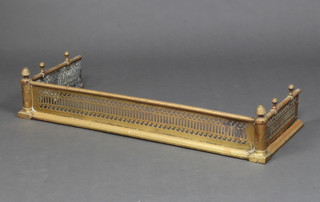 A 19th Century pierced brass fender 16cm x 84cm x 33cm 