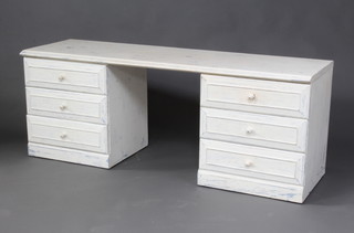 A white painted dressing table fitted 6 drawers with tore handles 58cm h x 152cm w x 47cm d